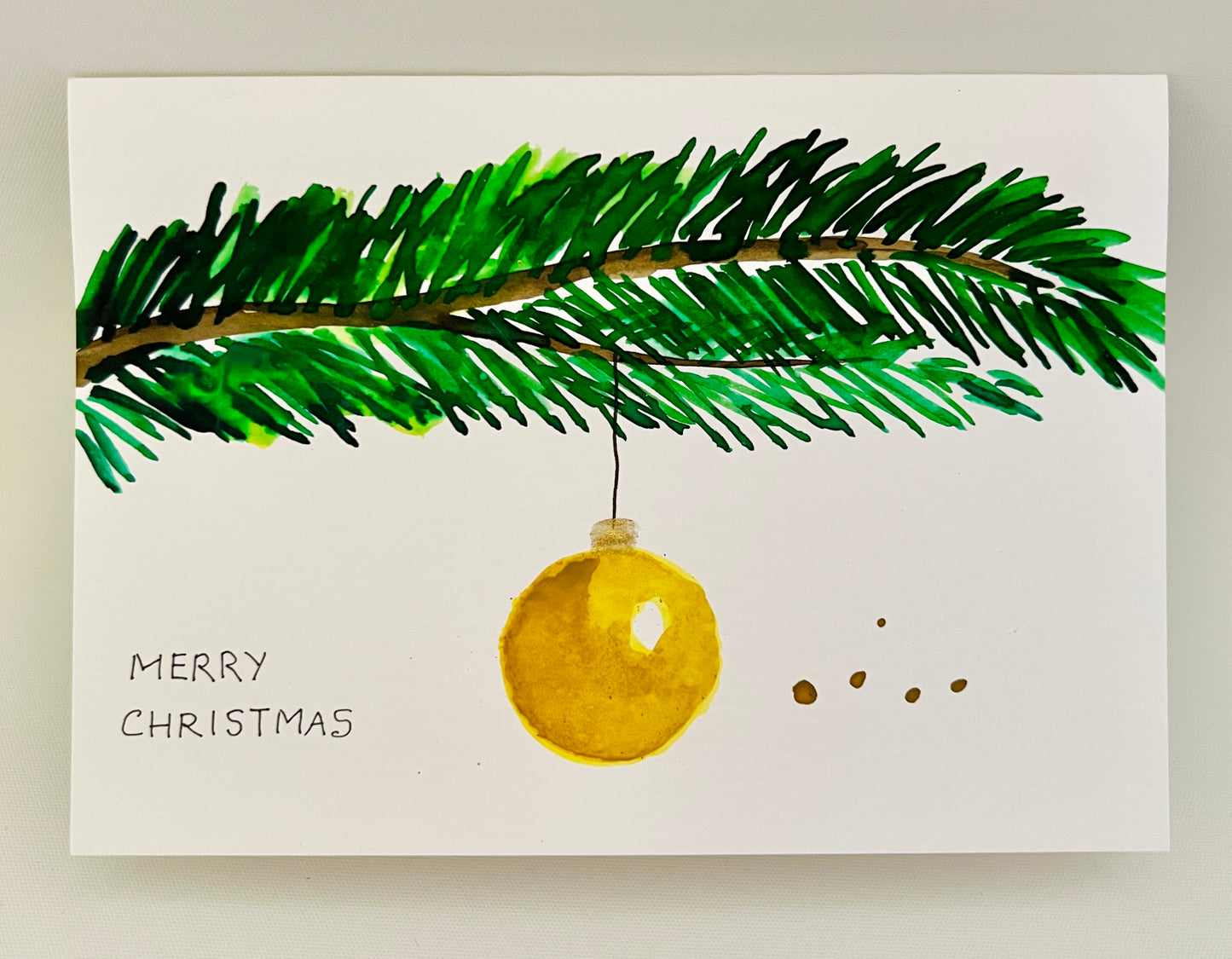 Hand-Painted Christmas Bauble on Tree