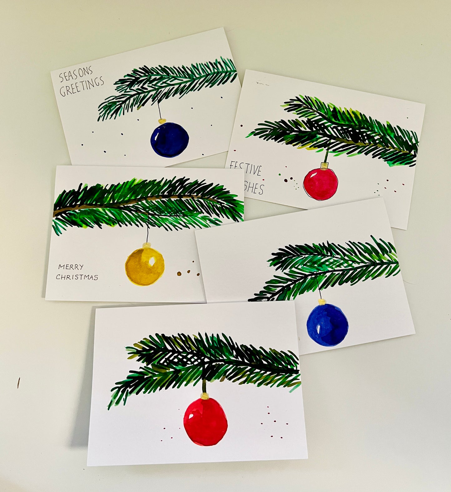 Hand-Painted Christmas Bauble on Tree