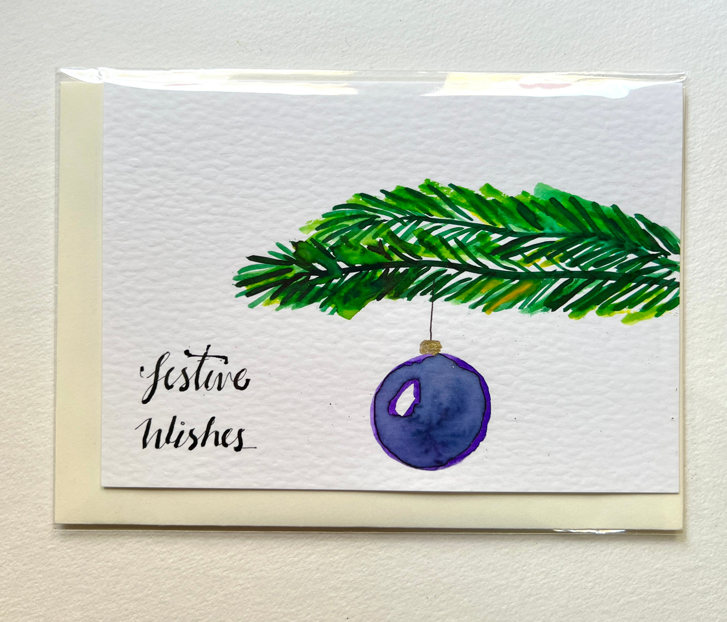 Hand-Painted Christmas Bauble on Tree